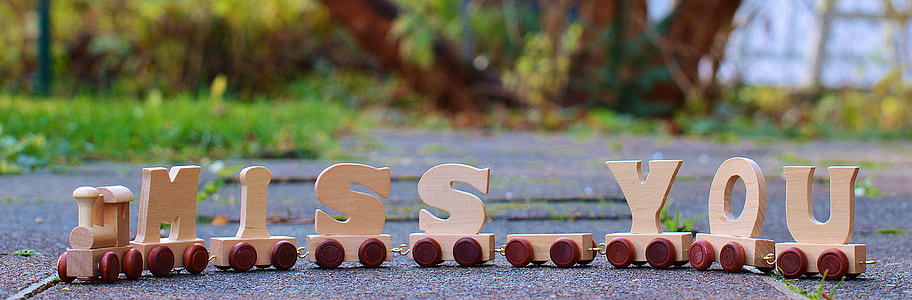 beige freestanding letters on gray concrete ground at daytimew thumbnail