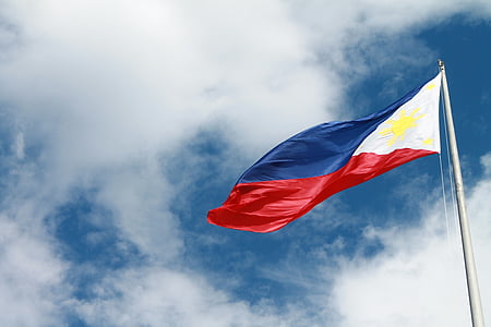 close-up photo of The Republic of Philippines flag at daytime thumbnail