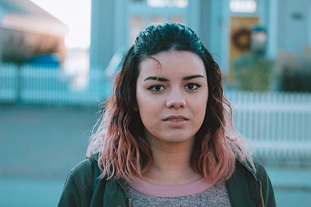 woman wearing green zip-up jacket close-up photo thumbnail