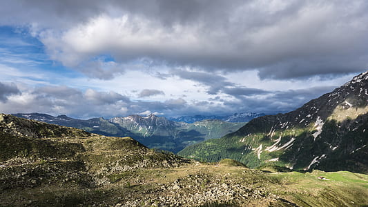 aerial photography of mountain during cloudy day thumbnail