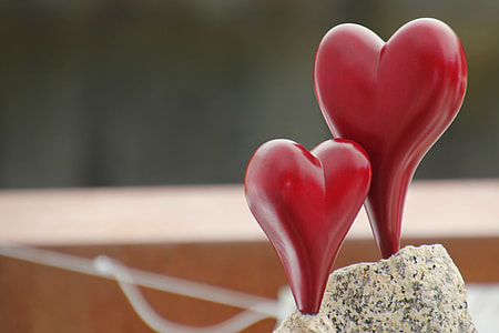 two red heart ornament focus photo thumbnail