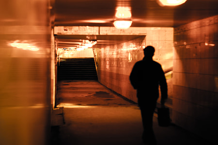 man walking inside subway thumbnail
