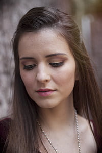 selective focus photo of woman wearing silver-colored ball chain necklace thumbnail