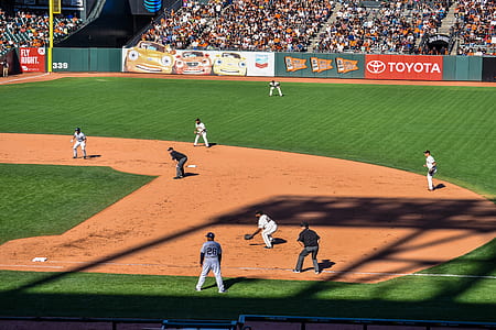 team playing baseball at field thumbnail