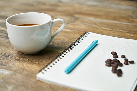 white ruled paper beside teacup thumbnail