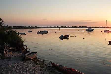 body of water during sunset thumbnail