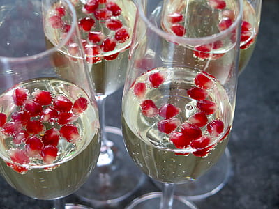 four filled champagne glasses thumbnail