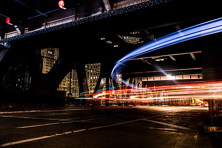 time lapse photo of vehicles passing through thumbnail