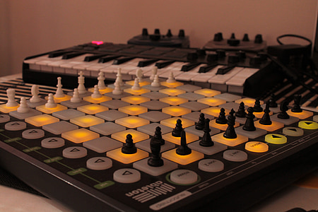 audio mixer beside electronic keyboard thumbnail