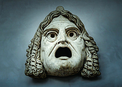 white face figurine thumbnail