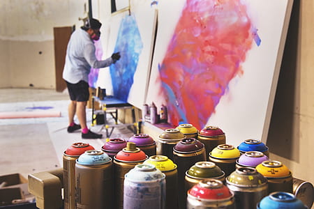 selective focus photography of paint sprayers thumbnail