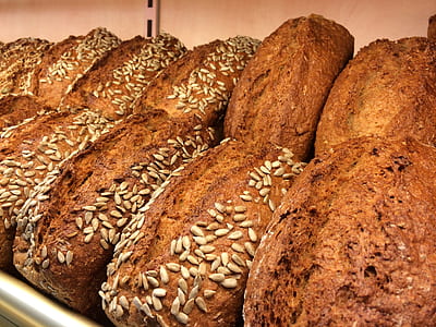 close-up photo of baked breads with sesame seeds toppings thumbnail