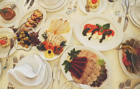 Assorted Dishes Served on White Ceramic Oval Plate on the Table thumbnail