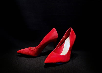 closeup photo of red leather pointed-toe heeled shoes thumbnail