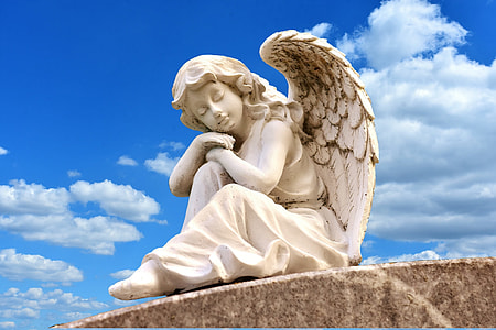 angel statue under blue sky thumbnail
