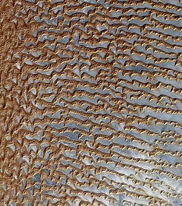sand with water reflecting sky thumbnail