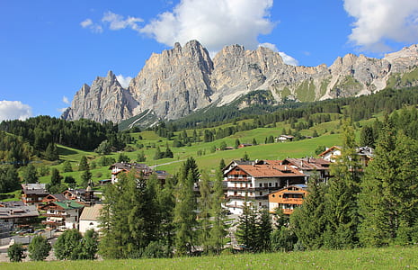 landscape photograph of town near mountain thumbnail