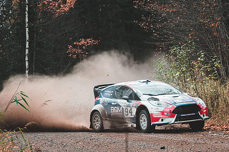 blue and red Ford Focus RS 3-door hatchback on road thumbnail