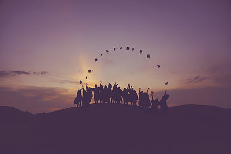 silhouette of group of people over the horizon thumbnail