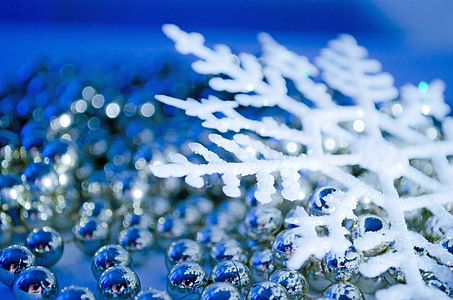 white and blue Christmas baubles and snow flake decors thumbnail