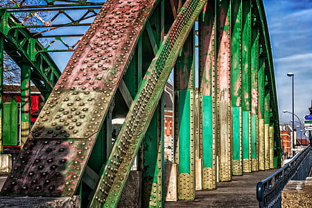gray and green metal bridge rail thumbnail