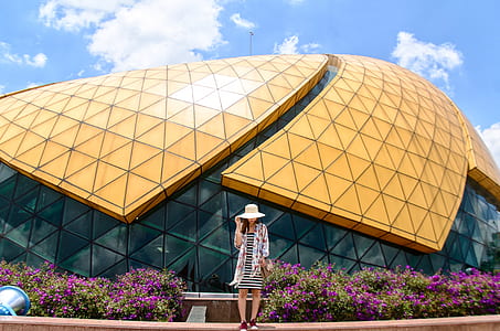 woman standing near building thumbnail