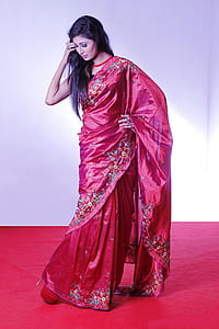woman wearing red floral sari thumbnail