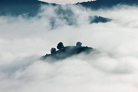 mountain surrounded by clouds thumbnail