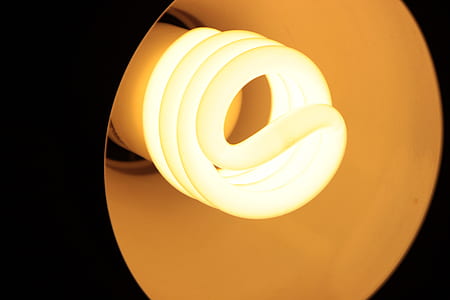 turned-on white CFL bulb thumbnail