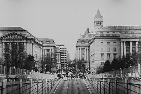 grayscale photo of highway to buildings thumbnail