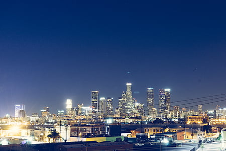 aerial photography of city buildings at nighttime thumbnail