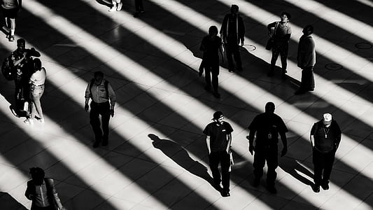 grayscale photography of people walking thumbnail
