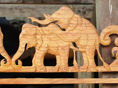 brown wooden elephant carving thumbnail