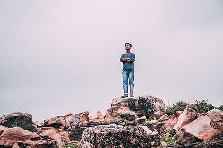 Man Standing On Rock thumbnail