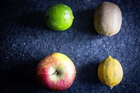 several fruits on top of gray table thumbnail