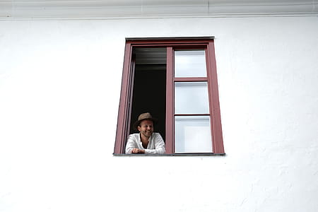 Person Looking Through Window thumbnail