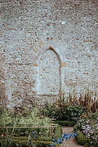 brown concrete wall building at daytime thumbnail