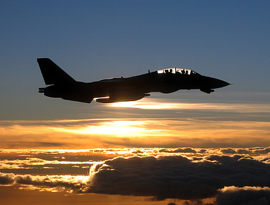 black jet plane under blue sky during golden hour thumbnail