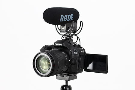 turned-off black Canon EOS DSLR camera with microphone thumbnail