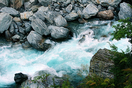 river between grey stones thumbnail