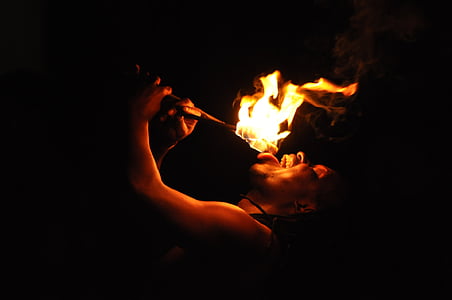 person performing using fire thumbnail