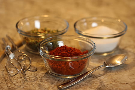 condiments on clear glass bowls thumbnail