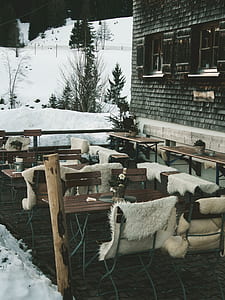 white textiles on brown wooden bench thumbnail