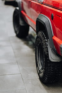 Old red Jeep Cherokee thumbnail