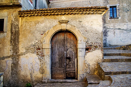 brown wooden door closed at daytime thumbnail