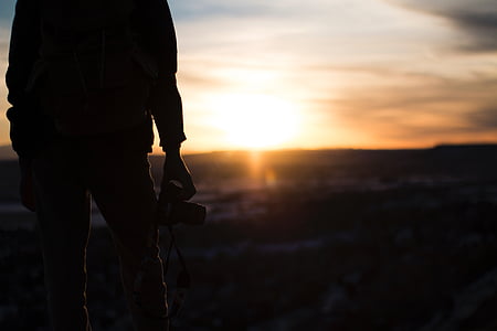 person holding camera thumbnail
