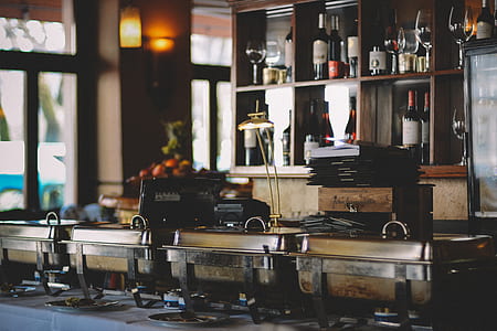 gold table lamp on table beside food warmers thumbnail