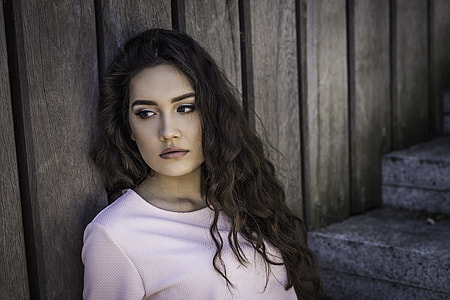 woman in pink scoop-neck long sleeve shirt thumbnail