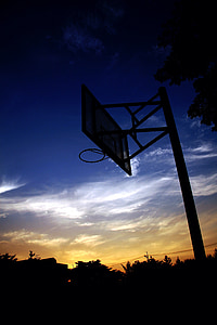 silhouette of portable basketball hoop thumbnail