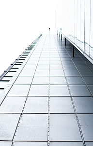 low-angle photography of gray building thumbnail